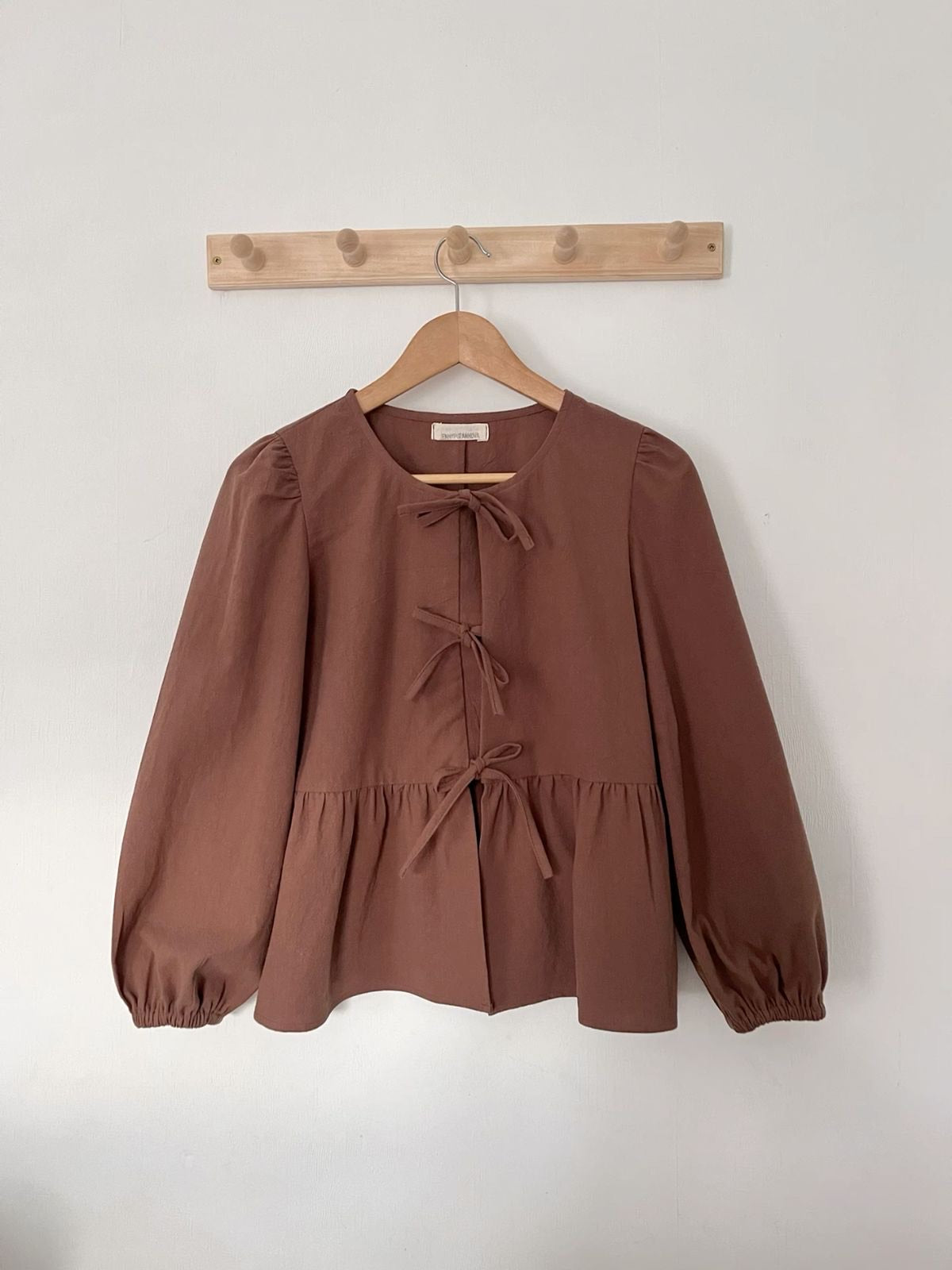 Bella Bow Peplum Blouse